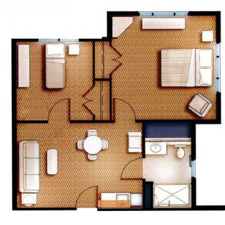 A floor plan of a two-bedroom apartment with furniture layout.