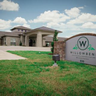 The Willows residential facility showcasing modern architecture amidst a serene landscape.