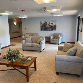 A cozy living room with comfortable seating and modern decor.
