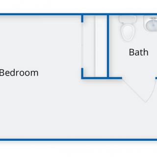 A simple floor plan showing a bedroom and a bathroom layout.