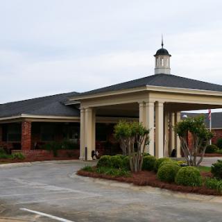 View of an elegant hospitality building with a welcoming entrance.
