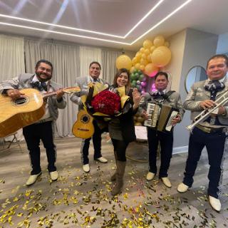 A vibrant mariachi band performing at a festive celebration.