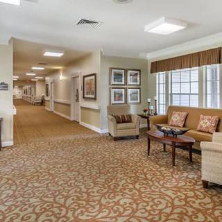 A cozy lobby area with seating and decorative elements.