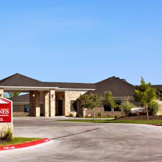 Exterior view of a residential building with a welcoming entrance.
