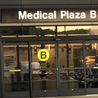 Entrance to Medical Plaza B, featuring clear signage.
