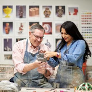 A collaborative pottery session showcasing creativity and craftsmanship.
