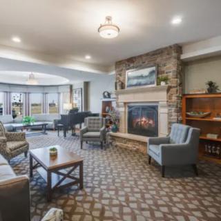 Cozy living room with a fireplace and comfortable seating.