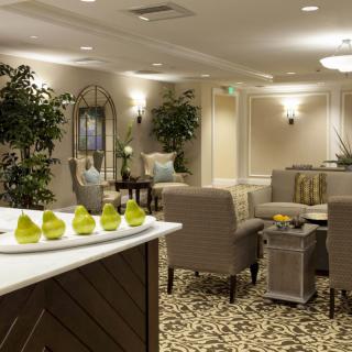 A stylish and comfortable lounge area with elegant decor and ample seating.