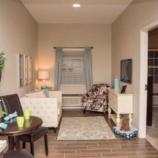 A cozy living room with modern decor and comfortable furniture.