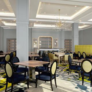 A stylish restaurant interior featuring elegant furnishings and a modern design.