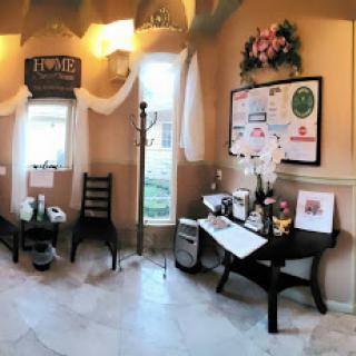 A welcoming reception area featuring elegant decor and comfortable seating.
