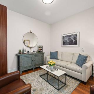 Cozy and stylish living room with a soft color palette and modern decor.