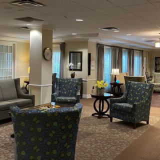A cozy lobby area with comfortable seating and warm lighting.
