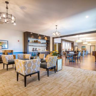 A modern lounge area with comfortable seating and contemporary lighting.