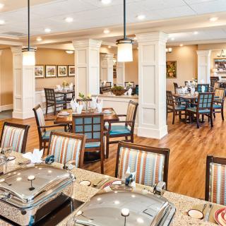 Elegant dining area with neatly arranged tables and comfortable seating.