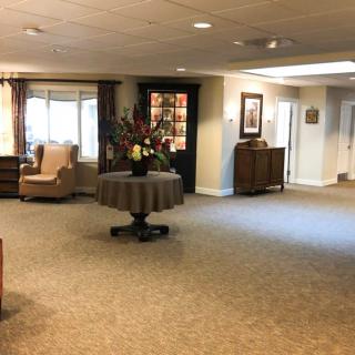 A spacious lobby with comfortable seating and elegant decor.