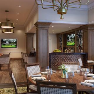 A stylish dining area with elegant decor, featuring wooden furniture and chandeliers.