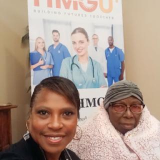 A cheerful selfie showcasing a moment of connection and care in a healthcare setting.