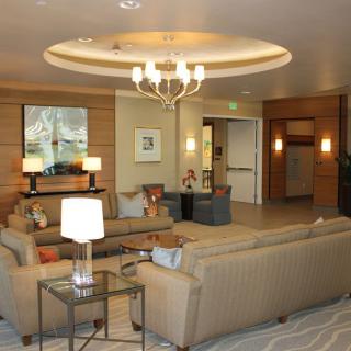 A modern lobby with comfortable seating and elegant lighting.