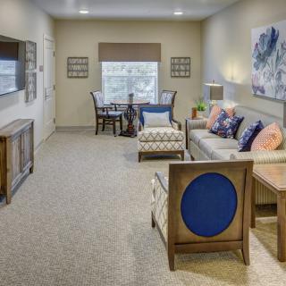 A modern living room with stylish furniture and decor.