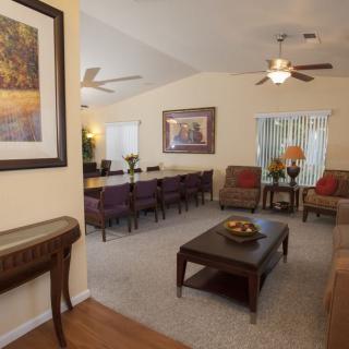 A modern living room with comfortable seating and elegant decor.