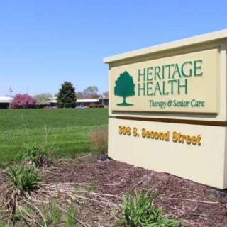 Exterior view of Heritage Health, showcasing the facility's signage and well-maintained landscape.