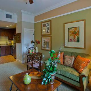 A cozy living room with comfortable seating and warm decor.