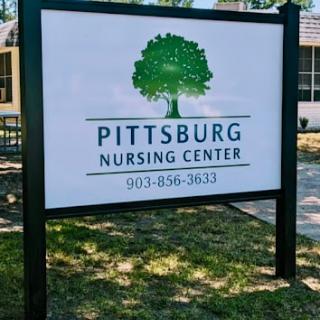 Sign for the Pittsburg Nursing Center, showcasing its name and contact number.