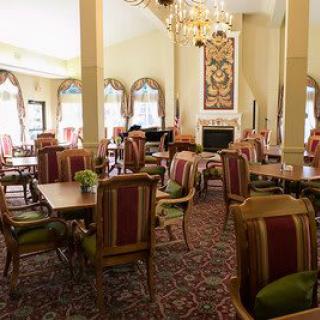 Elegant dining room with classic decor and luxurious furnishings.