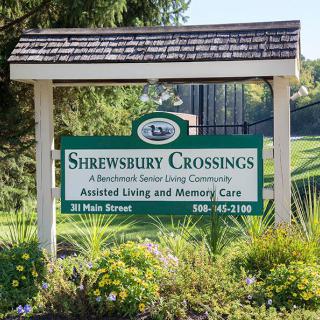 Sign for Shrewsbury Crossings, an assisted living and memory care community.
