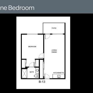 One bedroom apartment floor plan with a living room, kitchen, and bathroom.