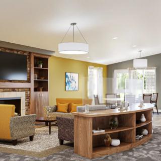 A modern living room with stylish furnishings, featuring a fireplace and a flat-screen TV.