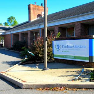 A view of a healthcare facility with clear signage on a sunny day.
