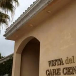 The entrance of the Vista del Care Center with visible signage and a palm tree nearby.