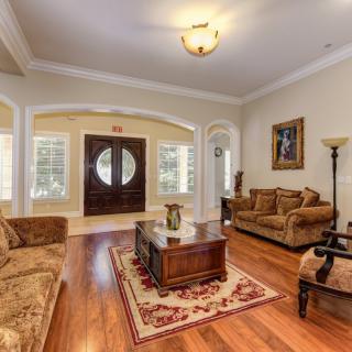 A cozy living room with elegant furnishings and a warm ambiance.