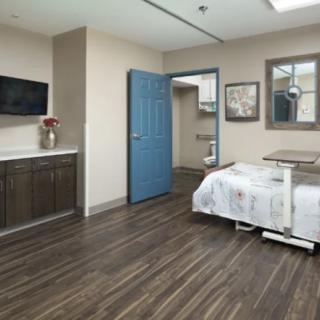 A modern hospital room equipped with essential amenities.