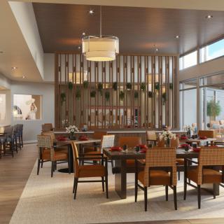 A modern restaurant dining area with stylish decor and comfortable seating.