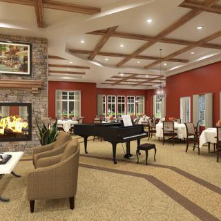 A cozy lounge area with a grand piano, comfortable seating, and dining tables near a fireplace.