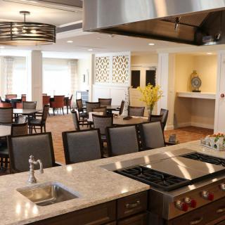 A modern kitchen and dining area with a spacious and elegant design.
