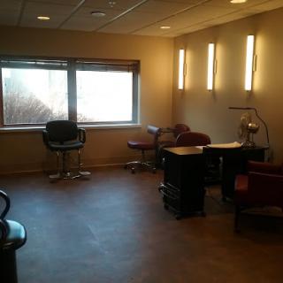 A quiet and organized office space with modern furniture and ample natural light.