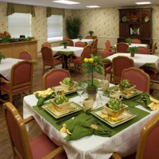 A well-decorated dining area with tables set for a meal.