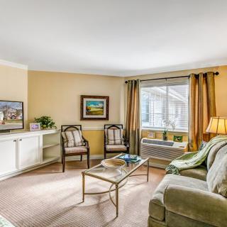 A cozy living room with comfortable seating and tasteful decor.