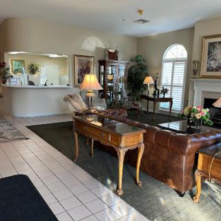 A warm and inviting living room with elegant furniture and a cozy atmosphere.