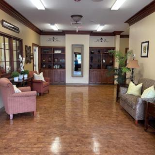 A welcoming lobby featuring comfortable seating and warm decor.