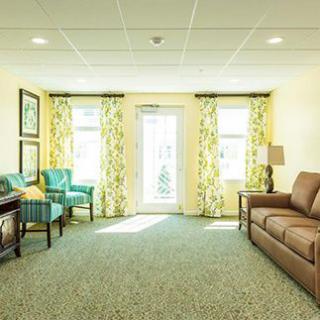 A bright and inviting living room with comfortable seating and elegant decor.