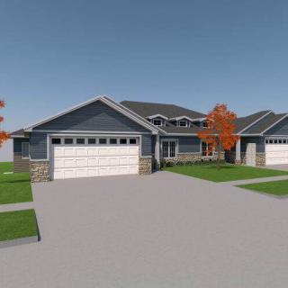 A modern suburban home with a two-car garage and autumn trees.