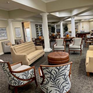A modern and cozy lounge area with comfortable seating and elegant decor.