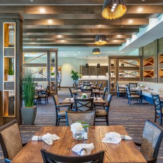Modern restaurant interior with elegant dining area and stylish decor.
