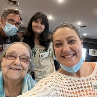 A joyful family gathering captured in a cheerful selfie.