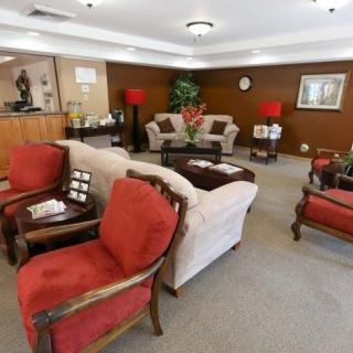 A welcoming lobby area with comfortable seating and warm decor.
